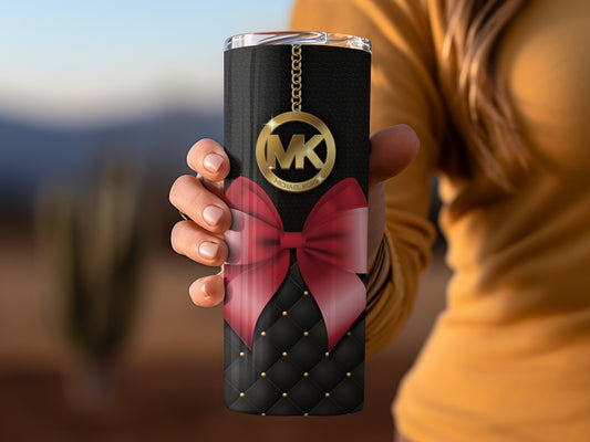 Stylish Tumbler with Gold Logo and Red Bow Design