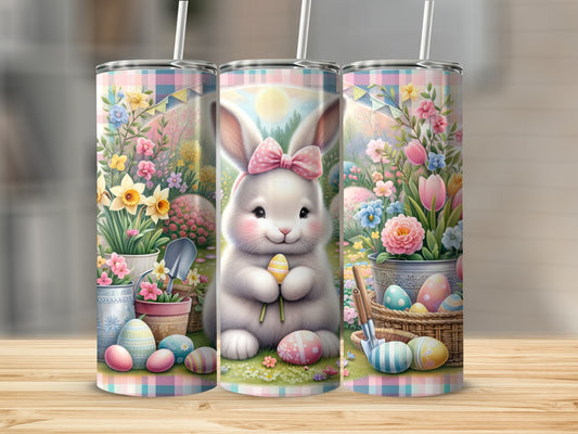 Easter bunny with eggs, watering can, and spring flowers.