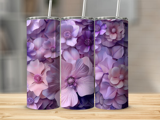 Three tumblers with a floral pattern of purple and pink paper flowers.