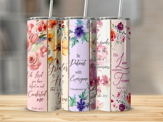 Three floral-patterned tumblers with Bible verses printed on them.