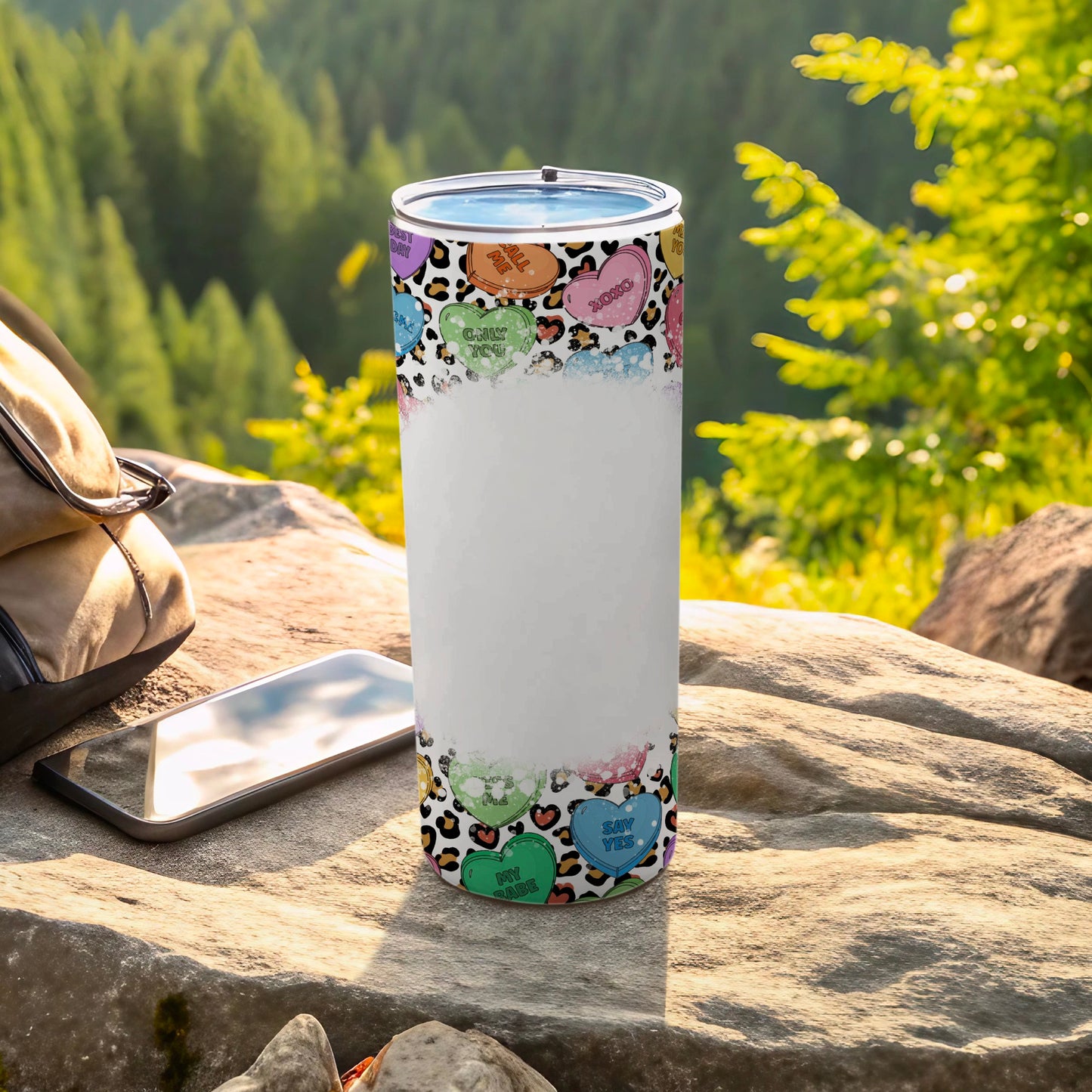 Tumbler with hearts and leopard print, some reading "Say Yes," "My Babe," and "Oxox."