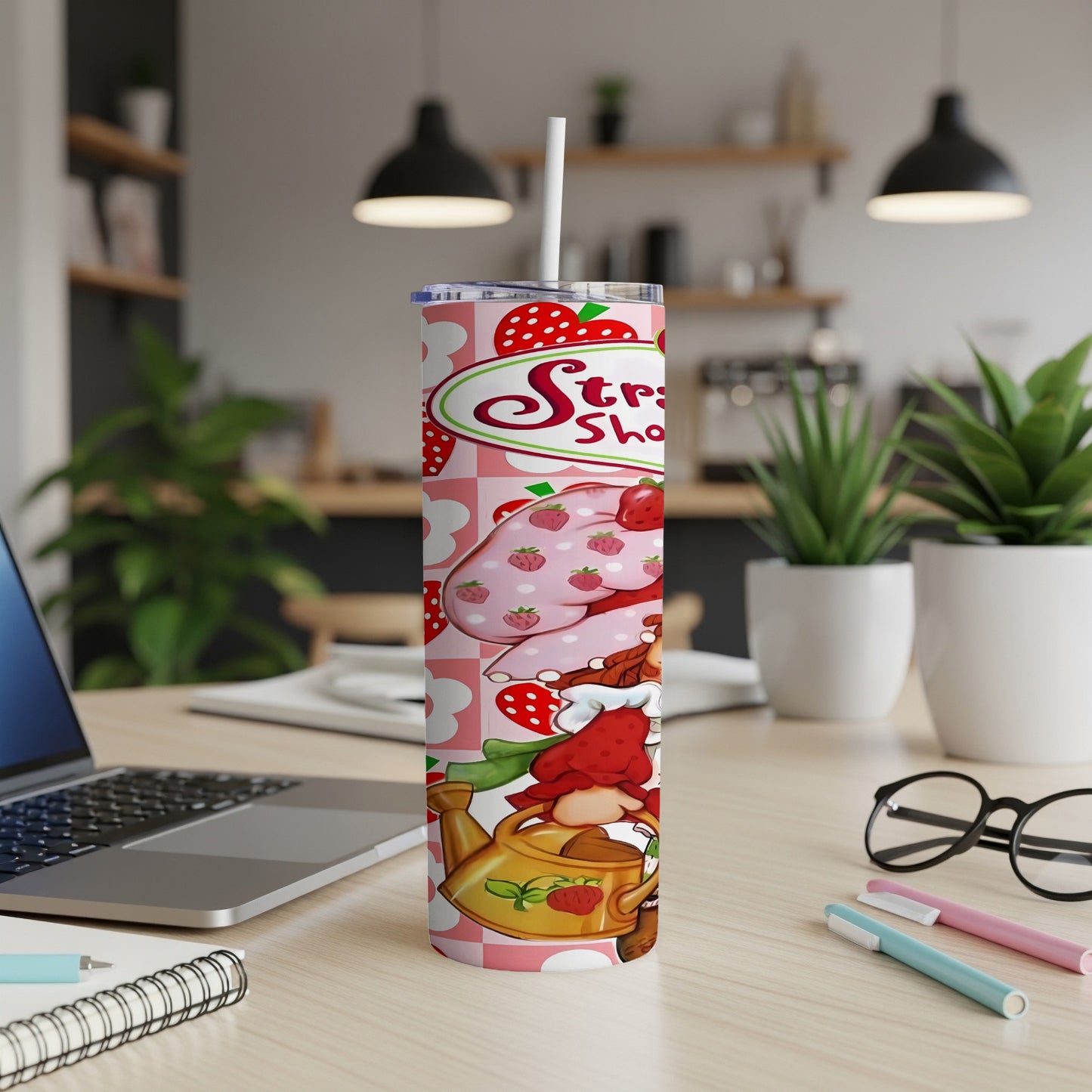 Strawberry Shortcake tumbler with watering can and strawberry pattern.