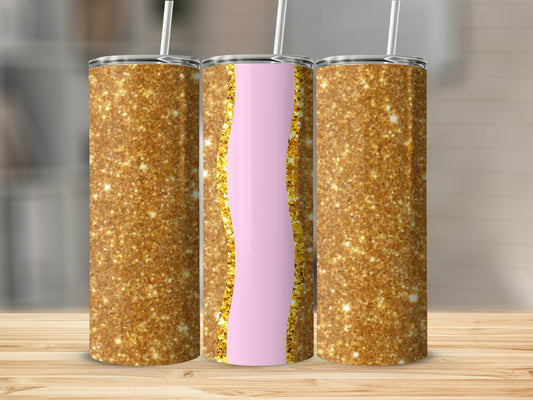 Gold glitter tumbler with pink stripe and straw.