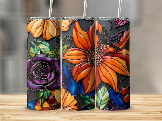 Three stained glass tumblers with floral and insect designs.