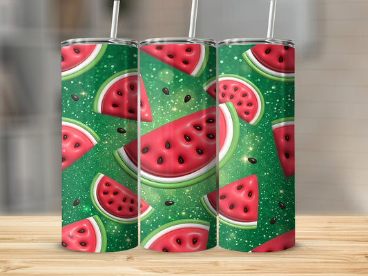 Watermelon slices on a sparkly green background with a straw.
