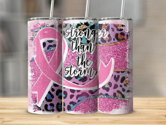 Pink glittery tumbler with leopard print and "Stronger than the storm" text.