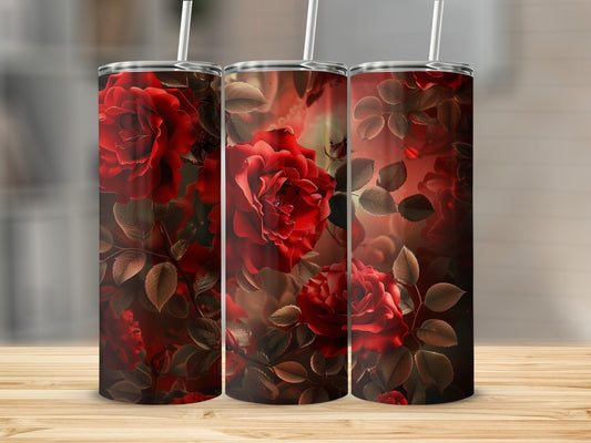 Three tumblers with deep red rose and foliage design on a wooden surface.