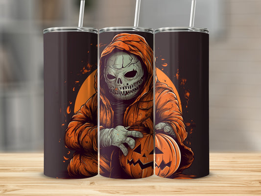 Skull in orange hoodie holding a jack-o-lantern on Halloween themed tumblers.