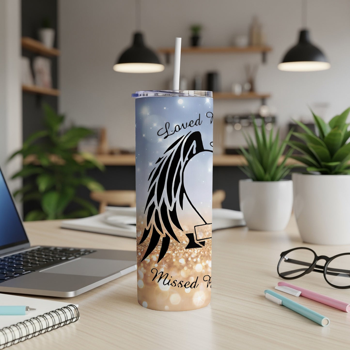 Tumbler with angel wings and text that reads "Loved and Missed."