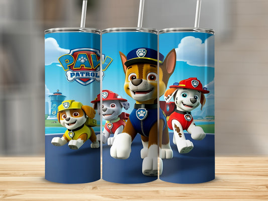 Paw Patrol characters Chase, Marshall, and Rubble on a blue tumbler.