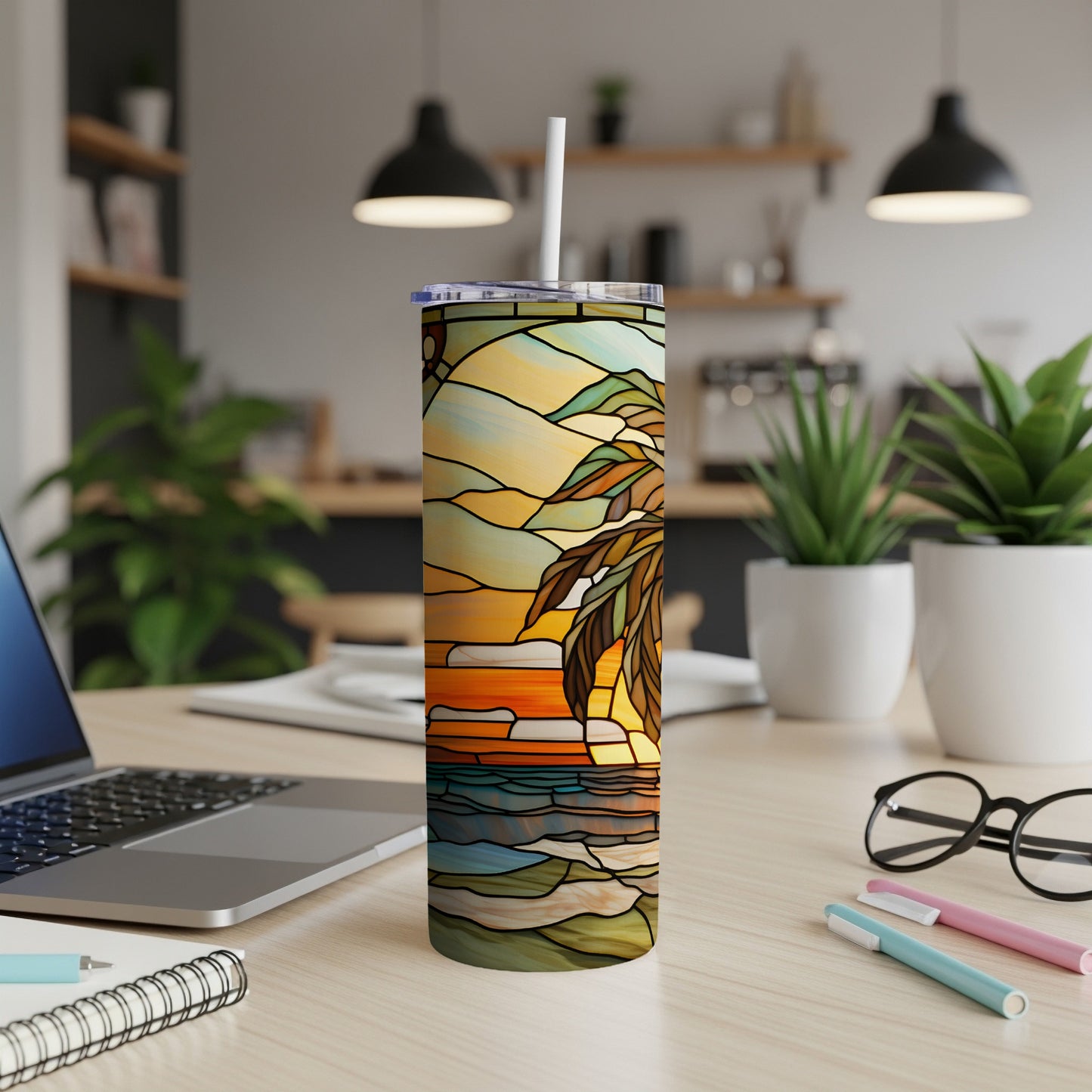Stained glass tumbler with palm tree and ocean sunset design.