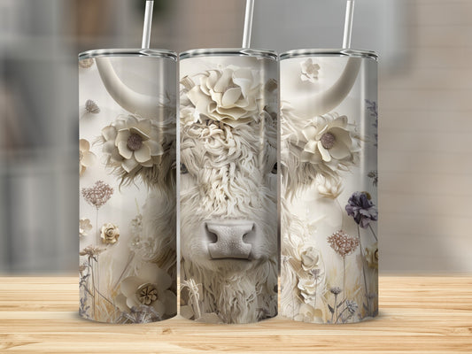 White cow with floral accents on a sublimation tumbler.
