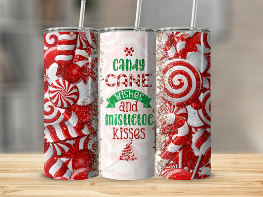 Candy cane wishes and mistletoe kisses tumbler with festive holiday candy patterns.