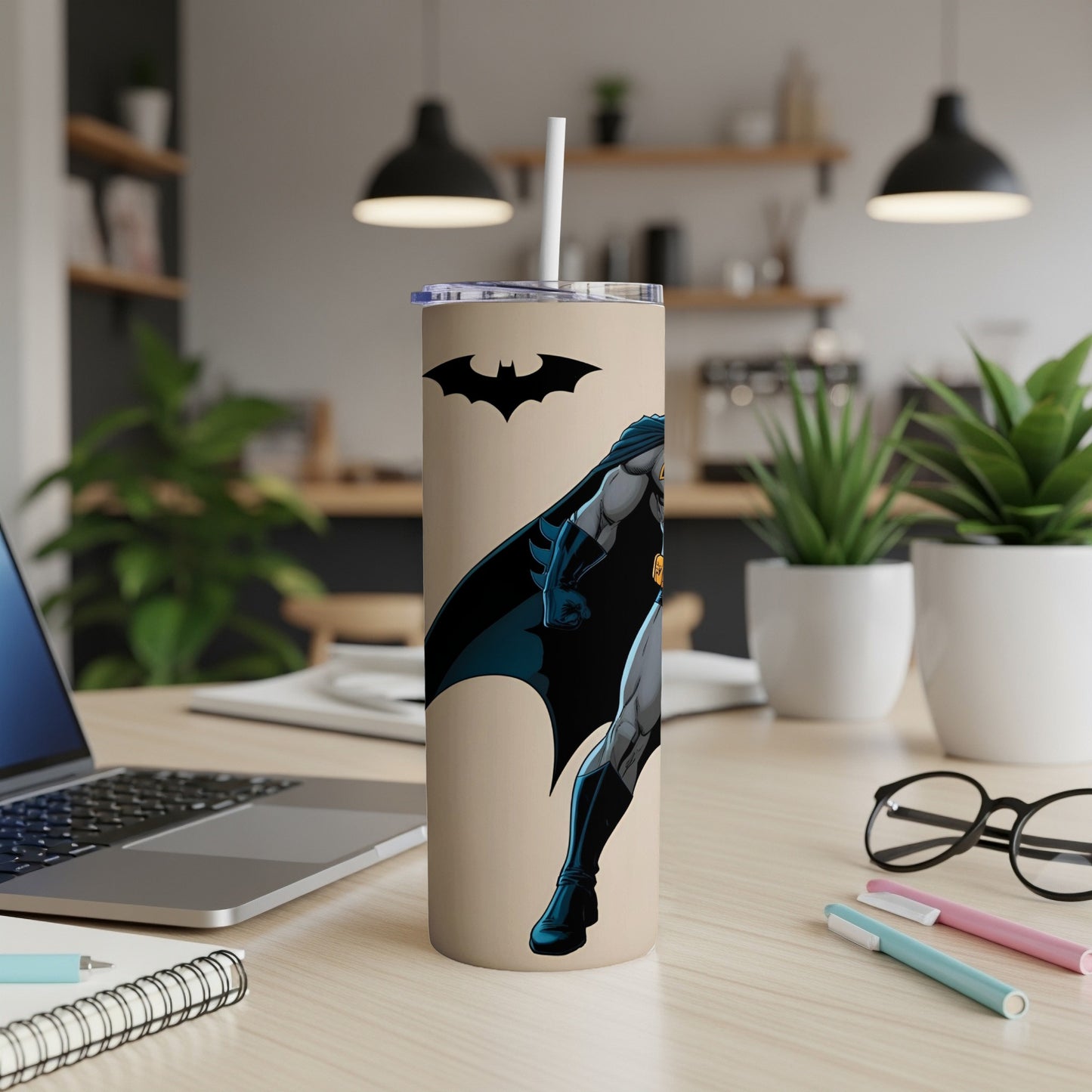 Batman superhero character on a beige tumbler with a straw.