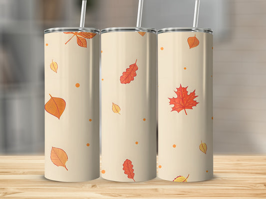Three seamless tumblers with fall leaf patterns and polka dots.