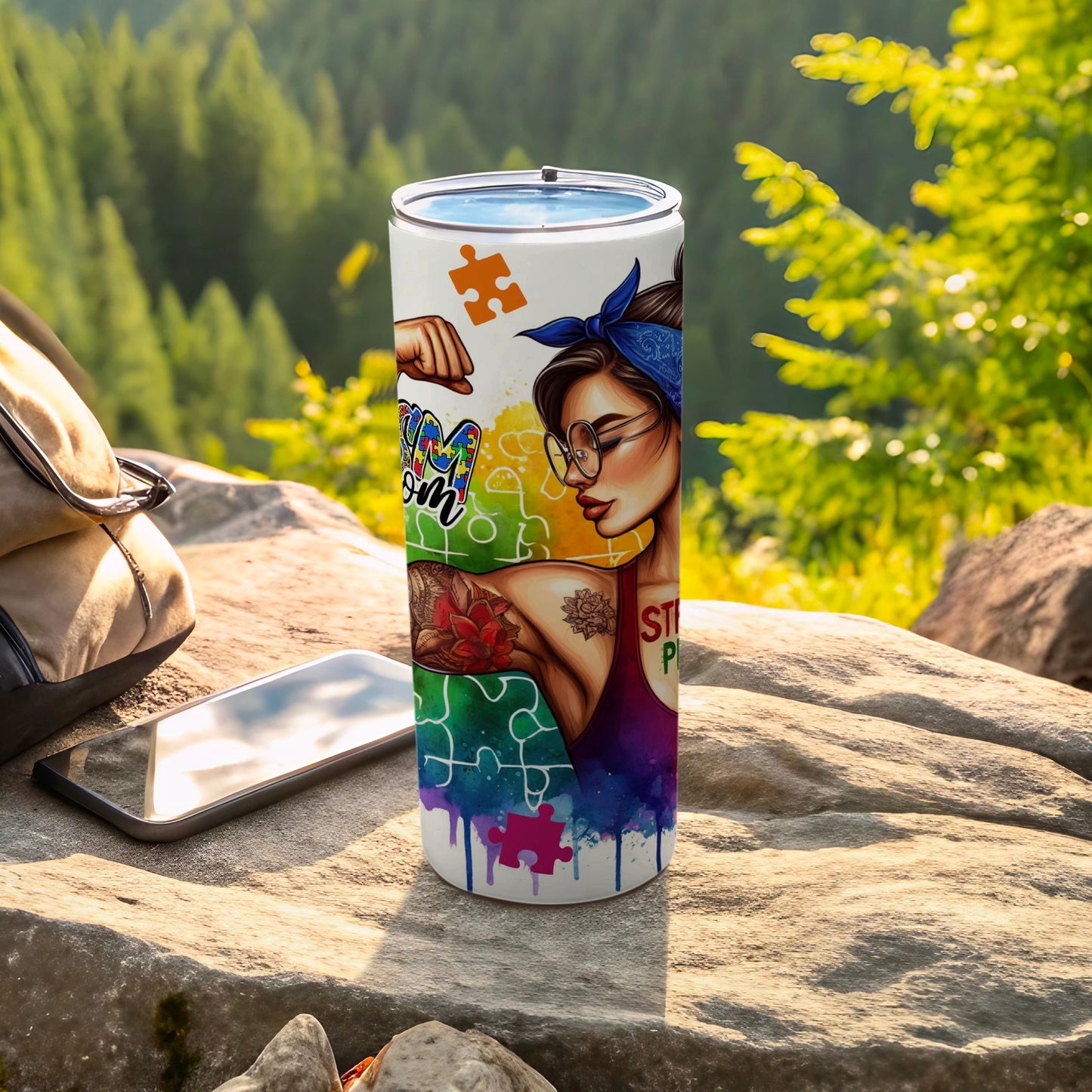 Tumbler with autism awareness puzzle piece design featuring a woman.