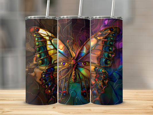 Colorful stained-glass butterfly design on three tumblers.