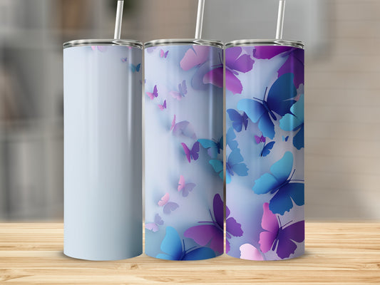 Three tumblers with butterfly designs in blue and purple.
