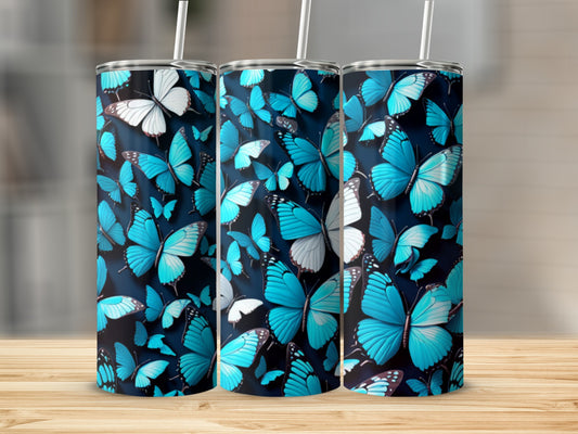 Collection of blue butterflies on a dark background, cylindrical tumbler.