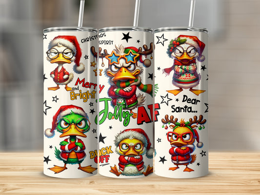 Three Christmas-themed tumblers featuring cartoon ducks with holiday decorations and text.