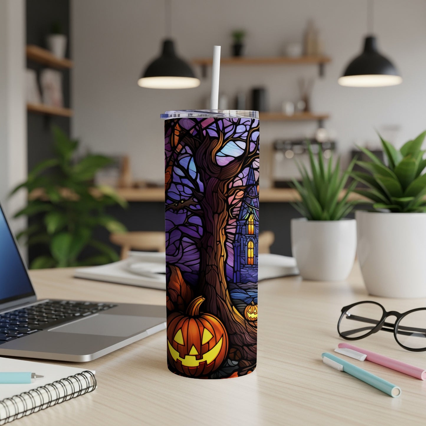 Tumbler with a spooky Halloween scene featuring a jack-o'-lantern and haunted house.