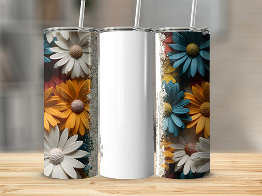 Three tumblers with floral designs on a wooden surface.