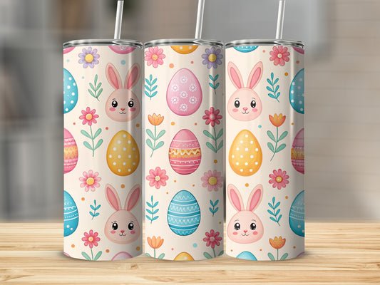 Easter bunny and egg pattern on three tumblers with straws.