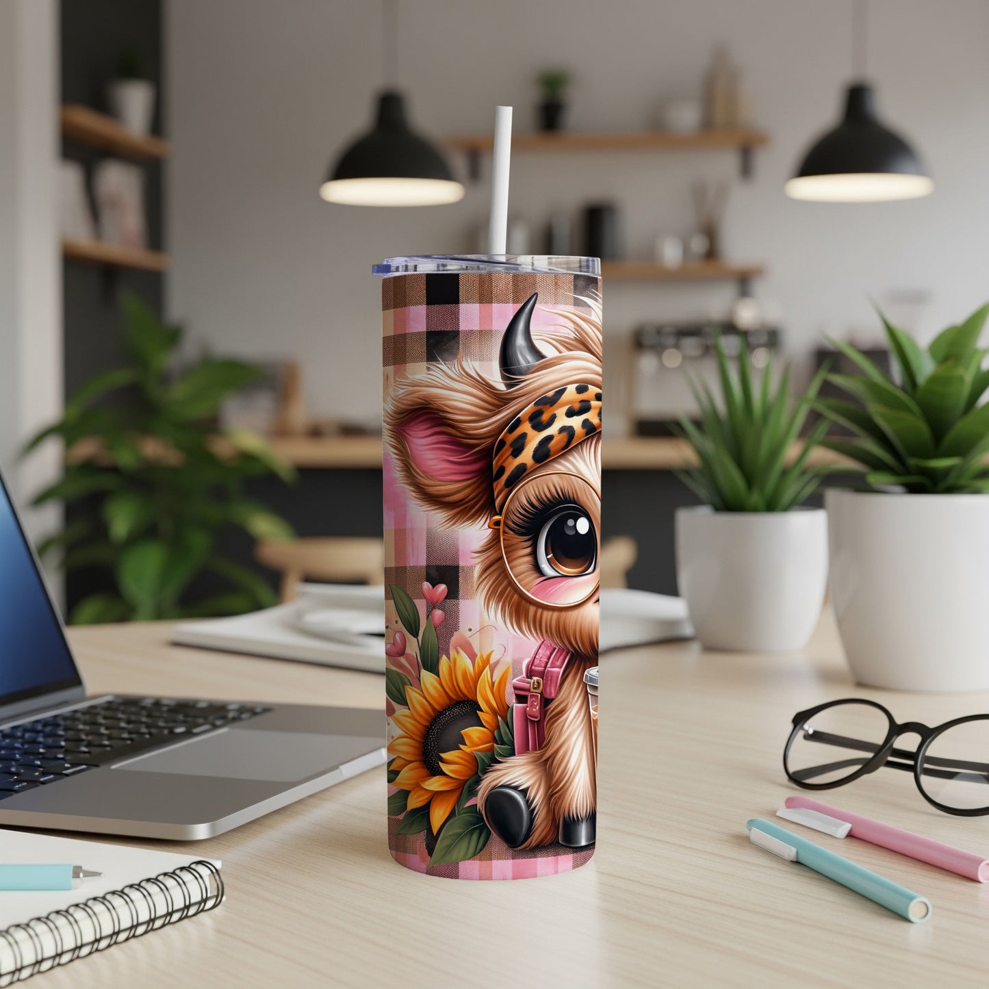 Cow illustration with sunflower and leopard print on a tumbler.