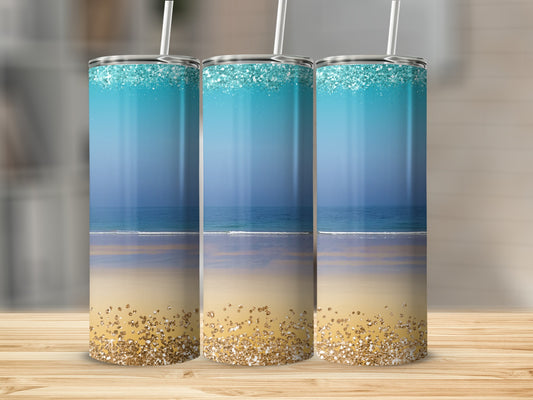 Three tumblers with beach scene and glitter detail.