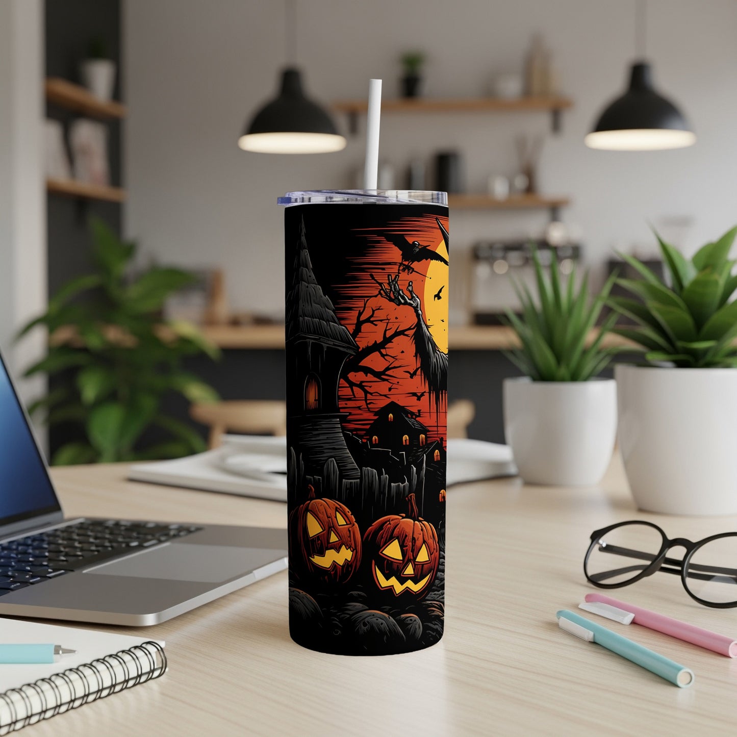 Halloween tumbler with spooky haunted house, bats, pumpkins, and a full moon design.