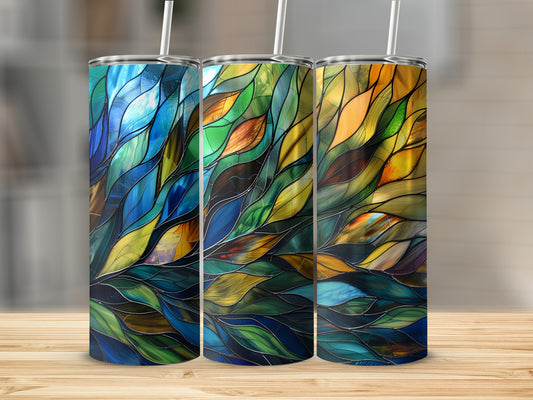 Three tumblers with stained-glass style abstract leaves in blue, green, and orange.