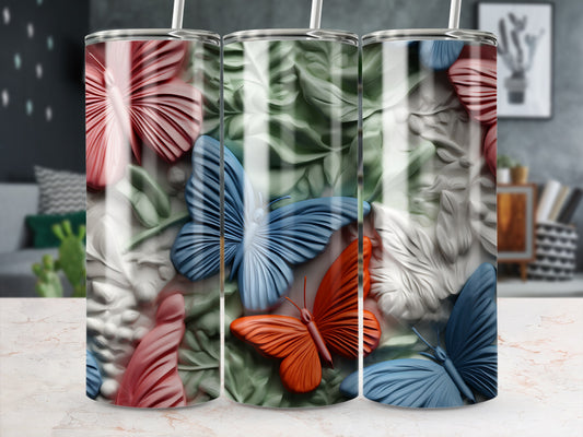 Three tumblers with a textured butterfly and leaf pattern.