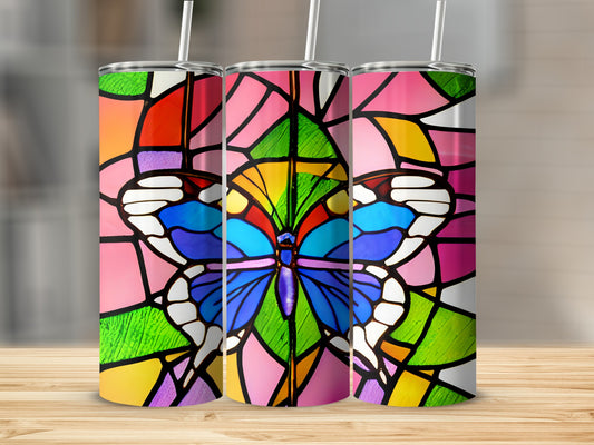 Three tumblers with stained-glass butterfly designs in vibrant colors.