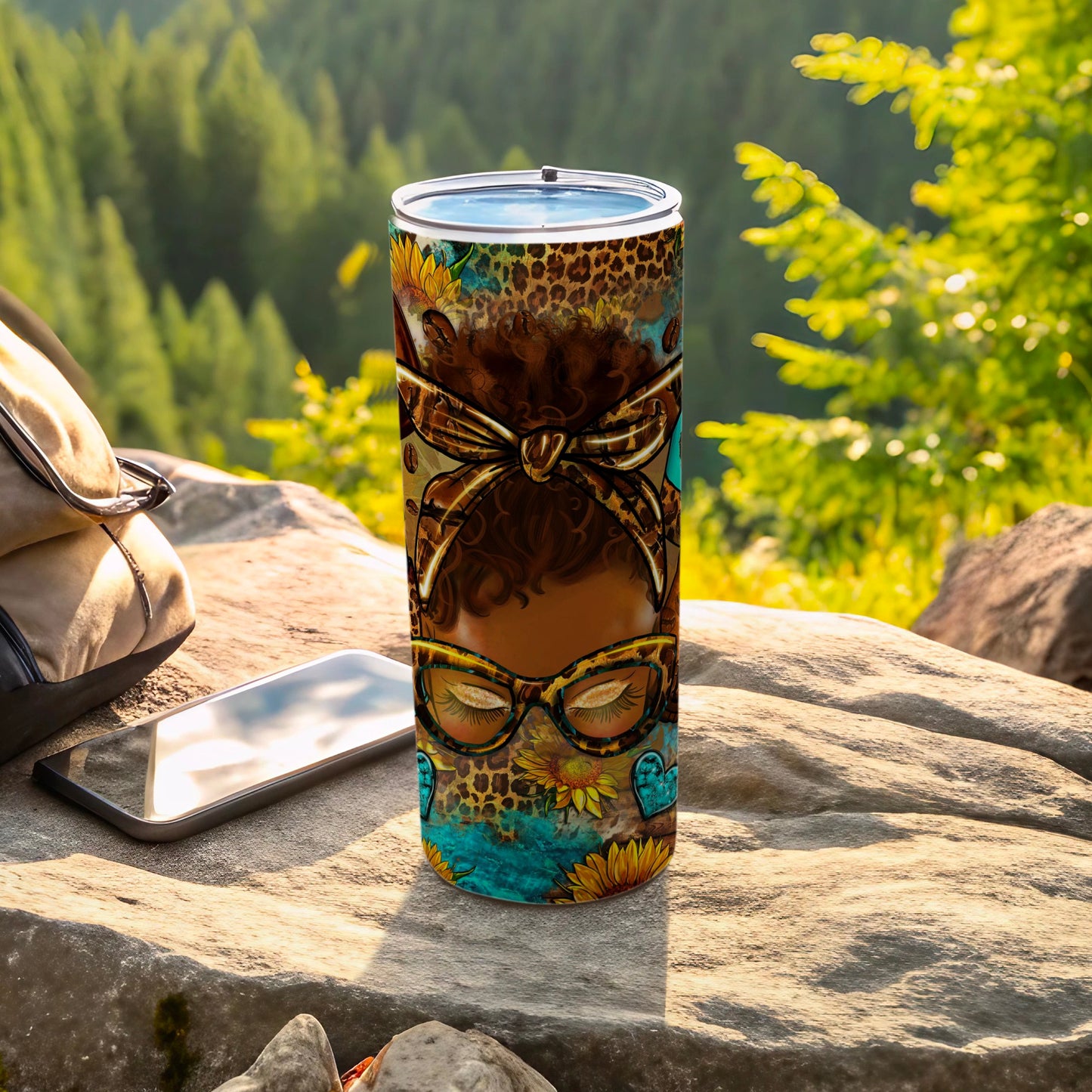 Tumbler with leopard print, sunflowers, and a woman's face.