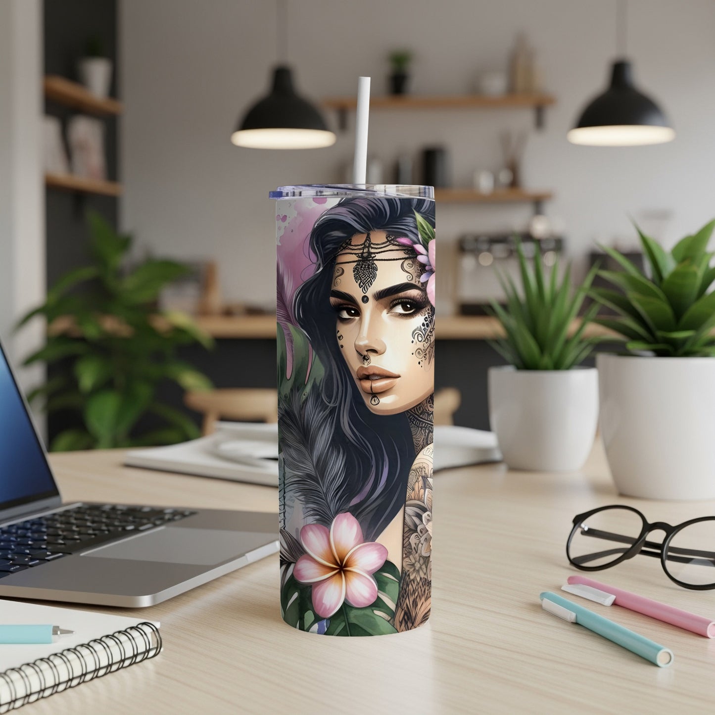 Tumbler with floral and tattooed woman design.