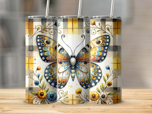 Butterfly and floral design on a plaid tumbler.