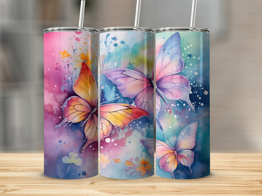 Three tumblers with watercolor butterfly designs in pink, purple, and blue.