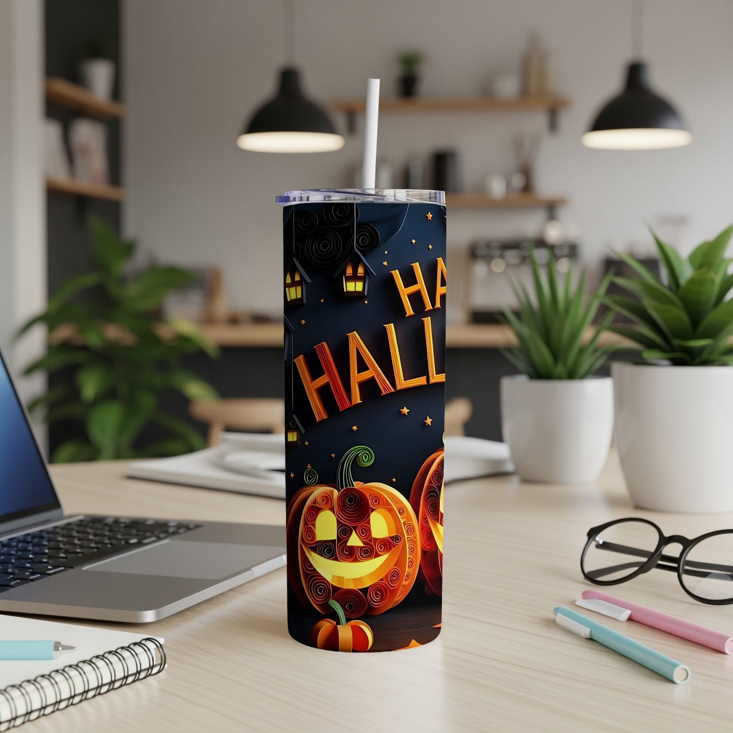 Halloween tumbler with pumpkins and "Happy Halloween" text on a dark background.