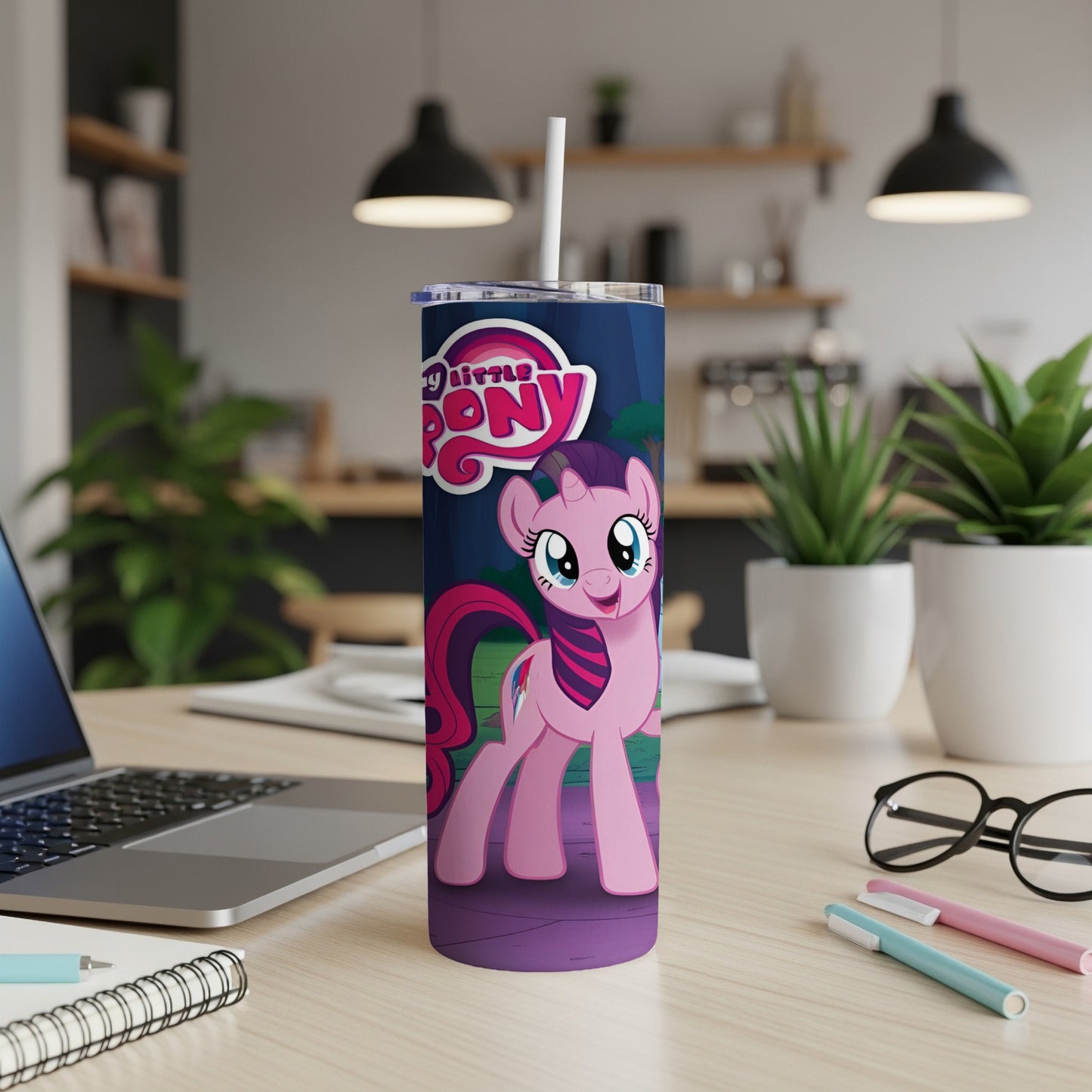 Pink Twilight Sparkle from My Little Pony on a blue tumbler with a straw.