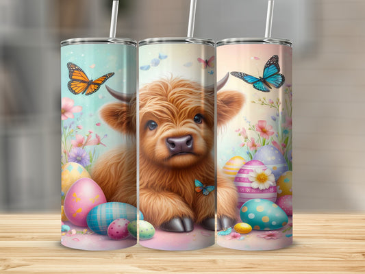 Highland cow with Easter eggs and butterflies, on three tumblers.