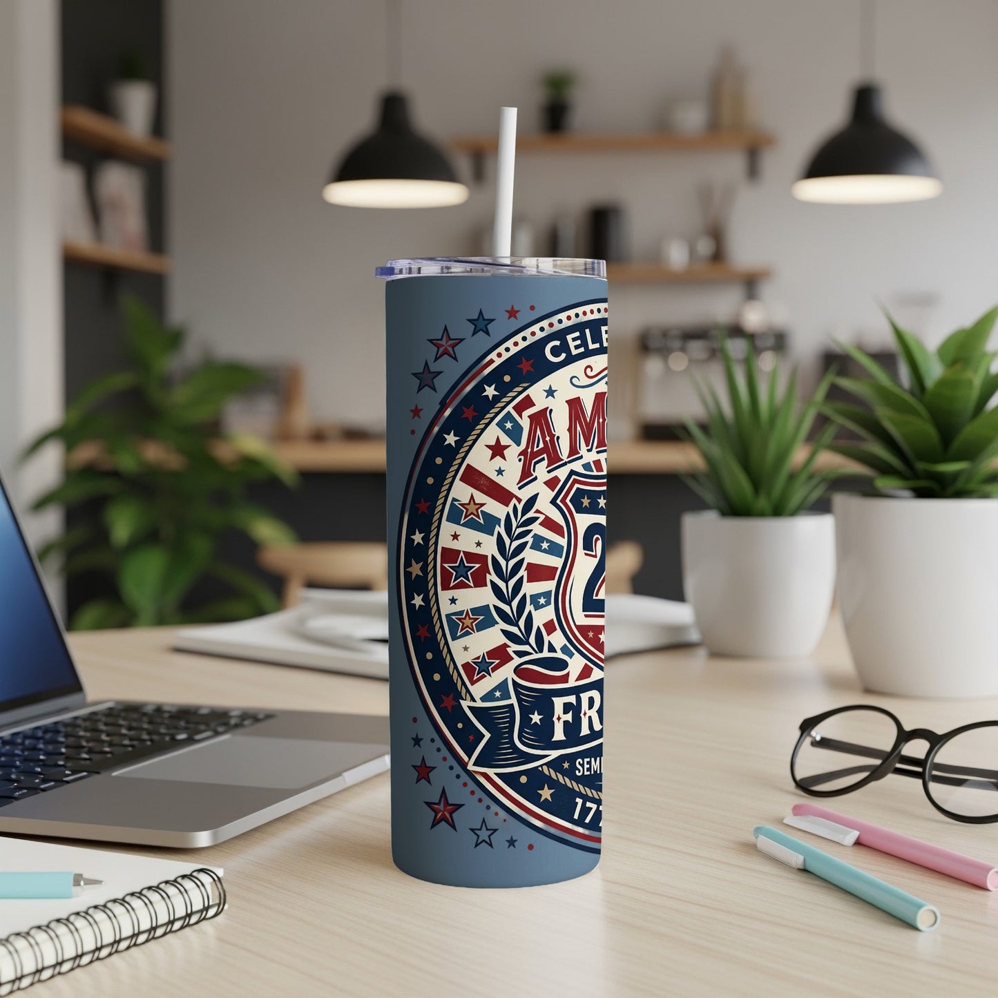 Blue tumbler with "America 250" and patriotic stars and stripes design.