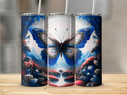 Tall tumbler with a blue butterfly and floral landscape design.