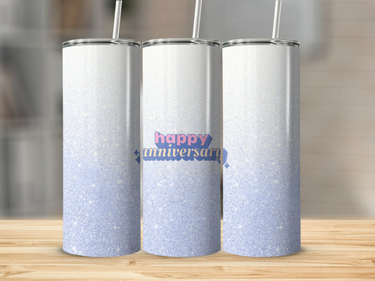 Three skinny tumblers with a "happy anniversary" design and glitter accents.