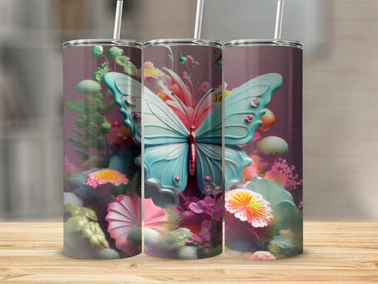 Two skinny tumblers with teal butterfly and floral designs on a wooden surface.
