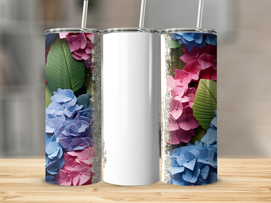 Three skinny tumblers with floral and glitter designs, one blank.