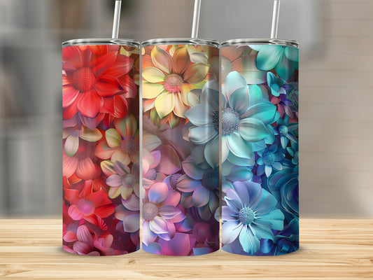Three tumblers with colorful floral patterns in red, yellow, and blue gradients.