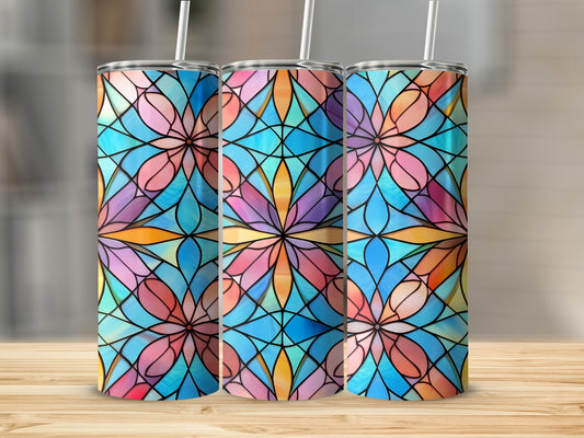 Three tall tumblers with a stained glass floral pattern in blues, pinks, and yellows.