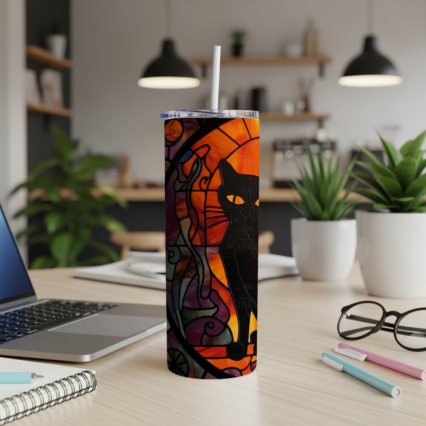 Black cat with stained glass pattern on a tumbler cup.