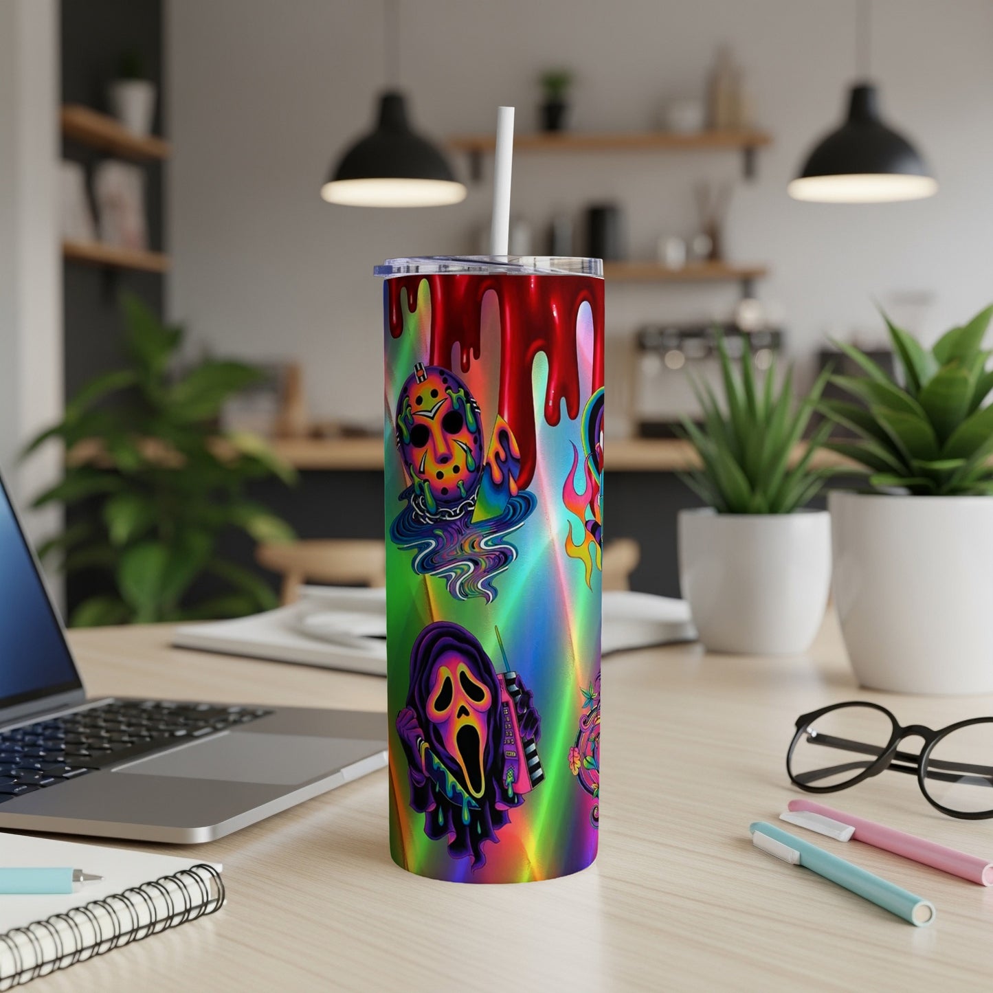 Tumbler with dripping blood and horror character designs on iridescent background.