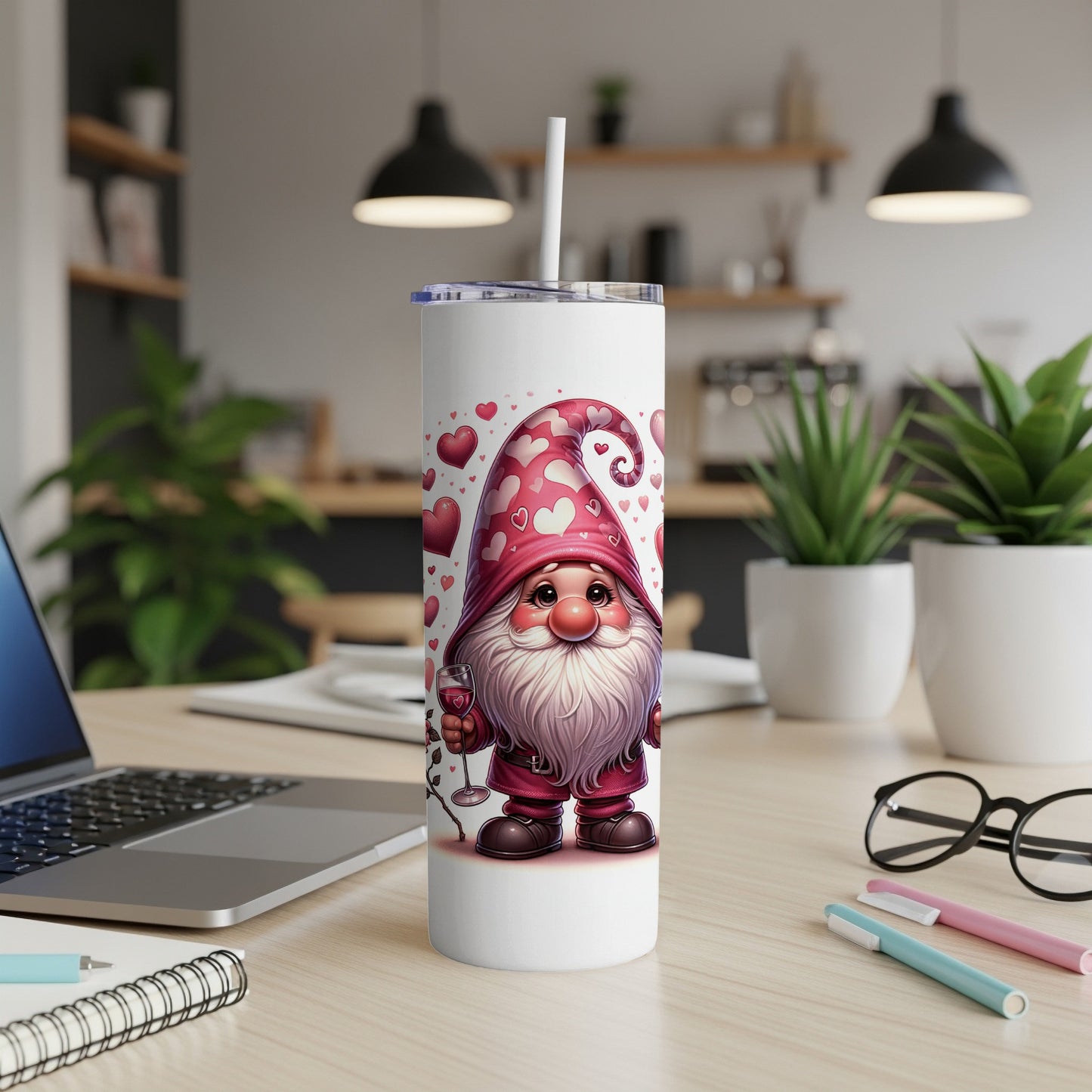 White tumbler with gnome holding wine, surrounded by hearts.